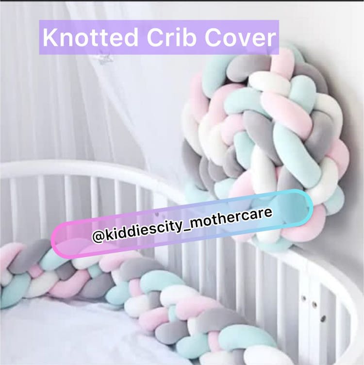Knitted cot bumper
